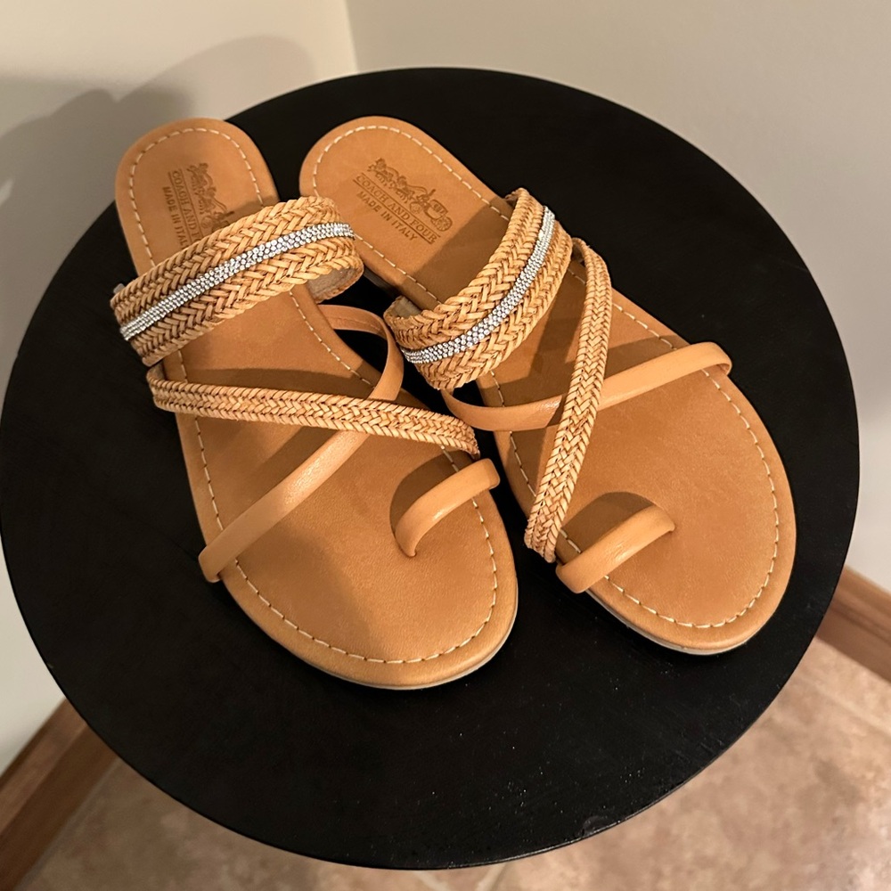 Coach and Four sandals.  Tan and Silver. Super cute and comfortable.